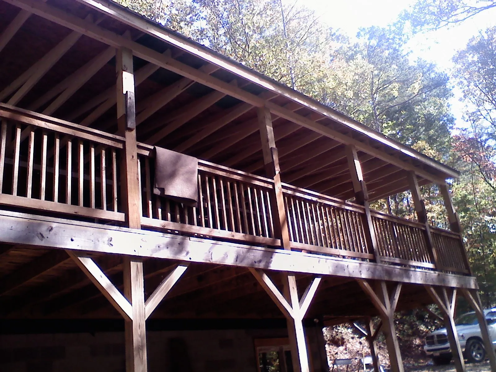 Timber framing under a new elevated porch and deck — Roof Leak Repair in Mohawk by Roofing Brothers